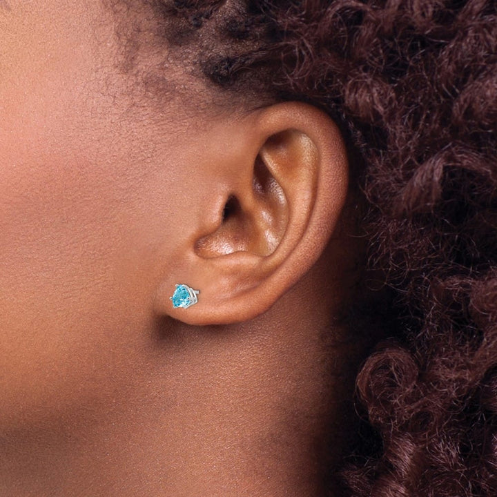 14K White Gold 5mm Trillion Blue Topaz Post Earrings, view 3 of 4