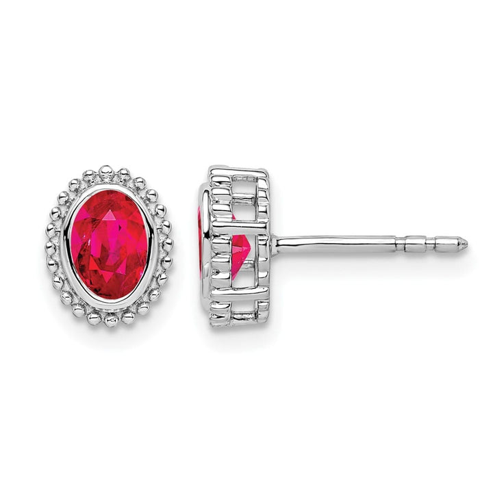 14K White Gold 5x3mm Oval Ruby Post Earrings, view 1 of 4