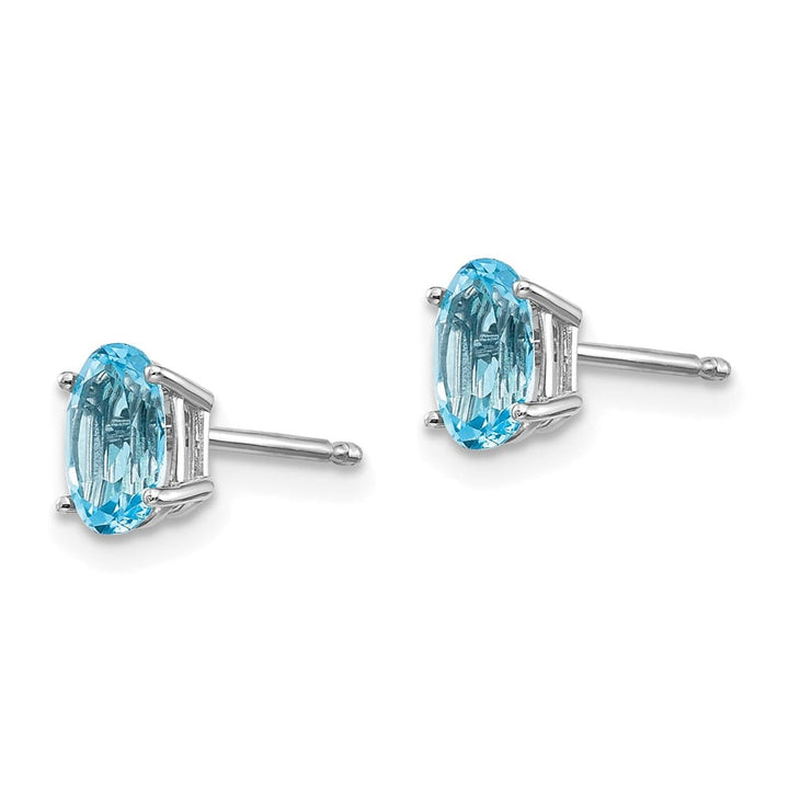 14K White Gold 6x4 Oval December/Blue Topaz Post Earrings, view 2 of 4