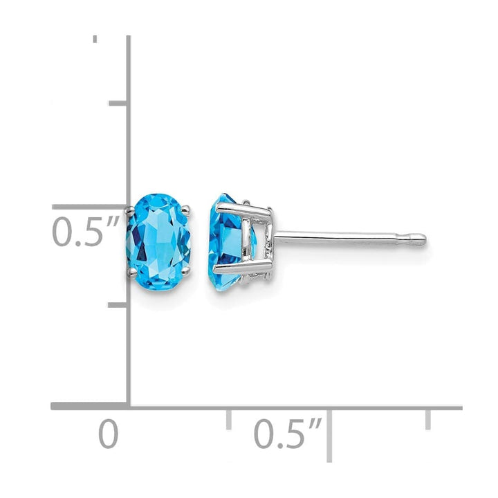 14K White Gold 6x4mm Oval Blue Topaz Post Earrings, view 4 of 4