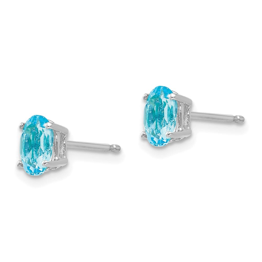 14K White Gold 6x4mm Oval Blue Topaz Post Earrings, view 2 of 4