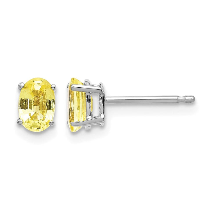 14K White Gold 6x4mm Oval Yellow Sapphire Post Earrings, view 1 of 4
