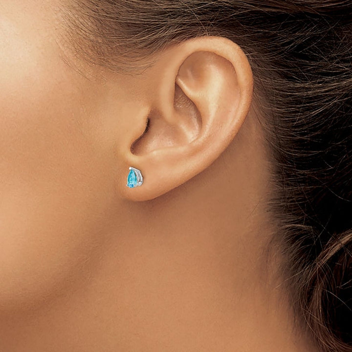 14K White Gold 6x4mm Pear Blue Topaz Post Earrings, view 3 of 4