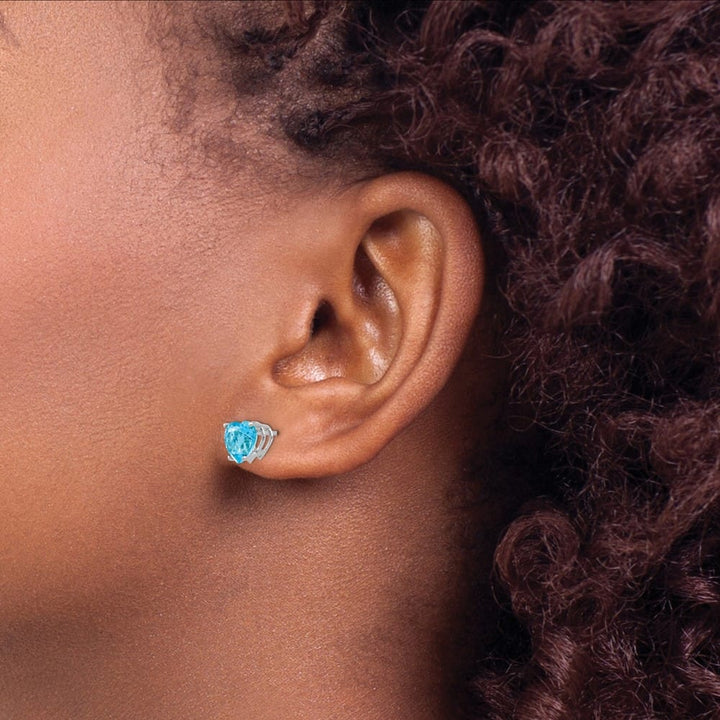 14K White Gold 7mm Heart Blue Topaz Post Earrings, view 3 of 4