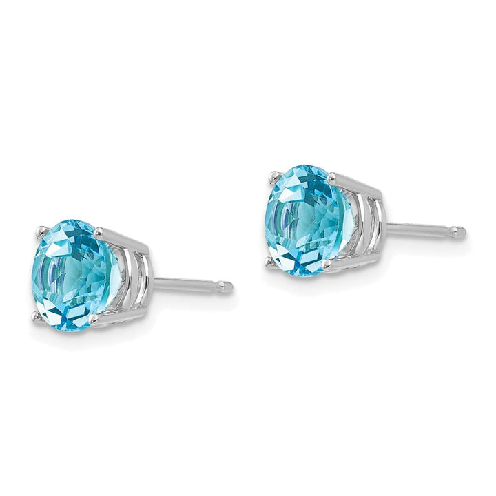 14K White Gold 7mm Round Blue Topaz Post Earrings, view 2 of 4