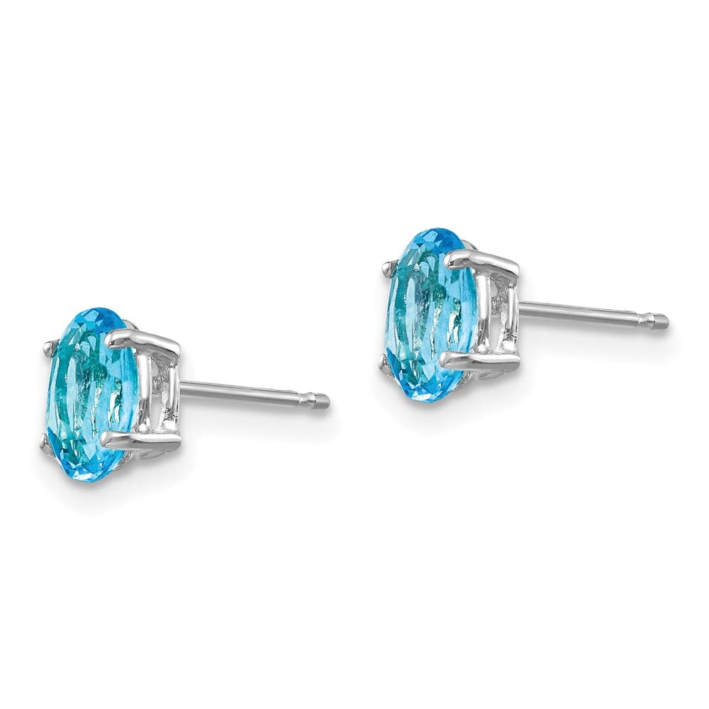 14K White Gold 7x5mm Oval Blue Topaz Post Earrings, view 2 of 4