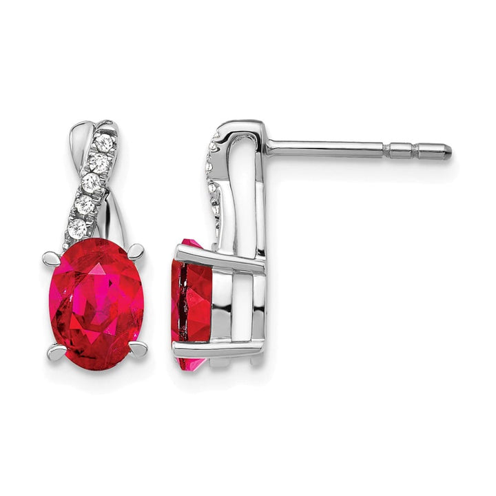 14K White Gold 7x5mm Oval Ruby and Diamond Post Earrings, view 1 of 4