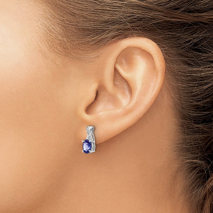 14K White Gold 7x5mm Oval Tanzanite and Diamond Post Earrings, view 3 of 4