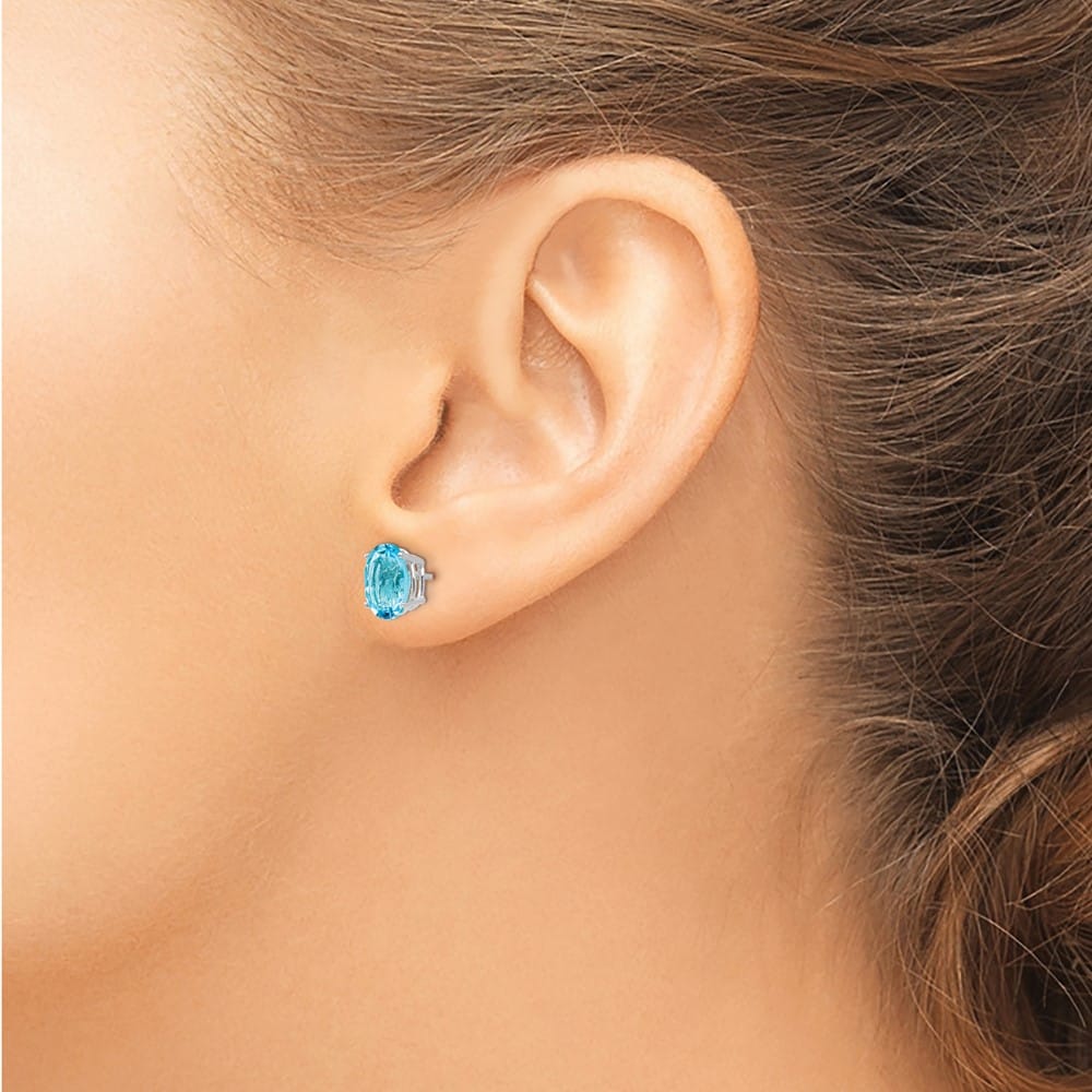 14K White Gold 8x6mm Oval Blue Topaz Post Earrings, view 3 of 4