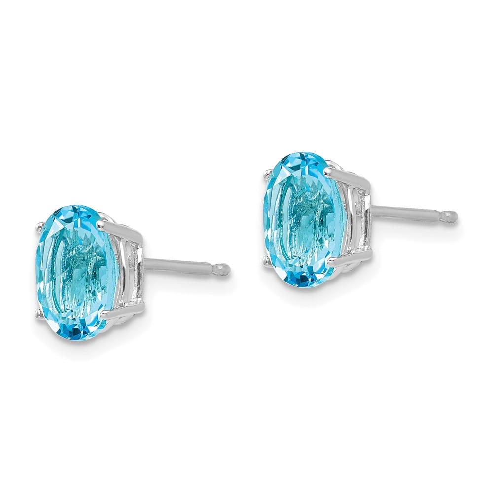 14K White Gold 8x6mm Oval Blue Topaz Post Earrings, view 2 of 4