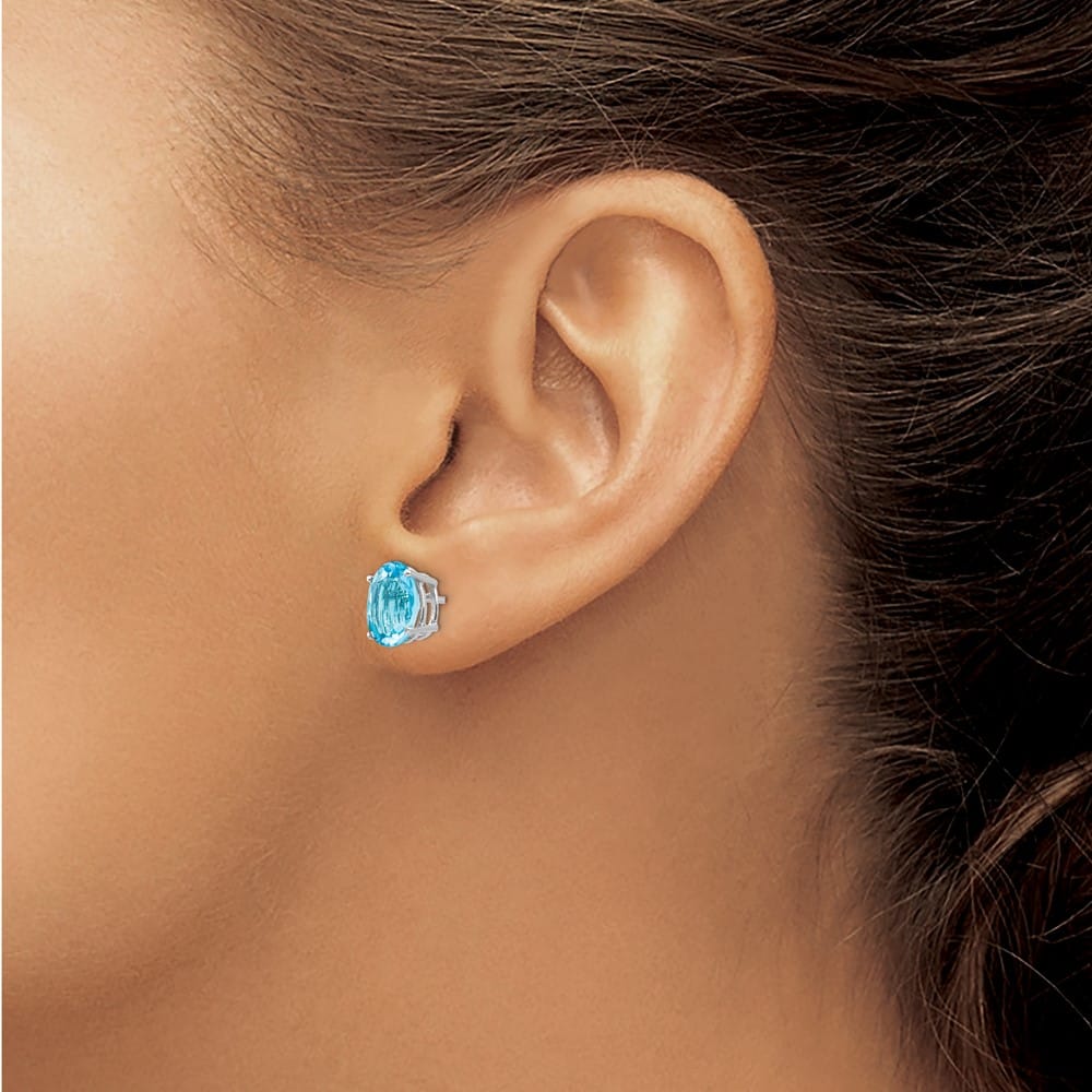 14K White Gold 9x7mm Oval Blue Topaz Post Earrings, view 3 of 4