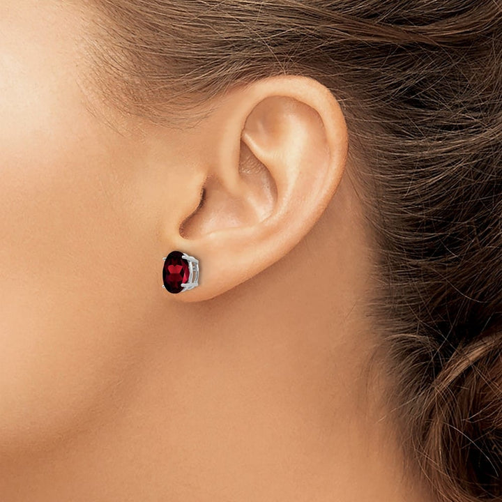14K White Gold 9x7mm Oval Garnet Post Earrings, view 3 of 4