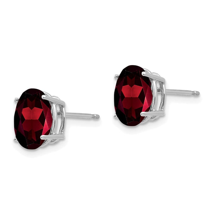 14K White Gold 9x7mm Oval Garnet Post Earrings, view 2 of 4