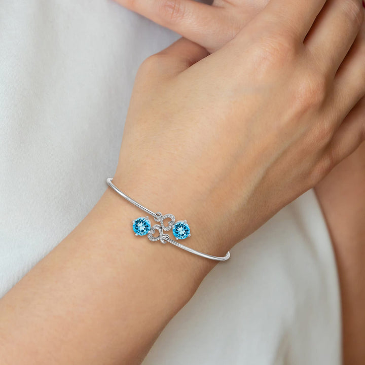 14k White Gold Round Blue Topaz and 1/8 carat Diamond Hearts Flexible