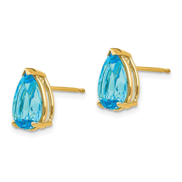 14K Yellow Gold 10x7mm Pear Blue Topaz Post Earrings, view 2 of 4