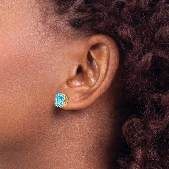 14K Yellow Gold 10x8mm Oval Blue Topaz Post Earrings, view 4 of 4