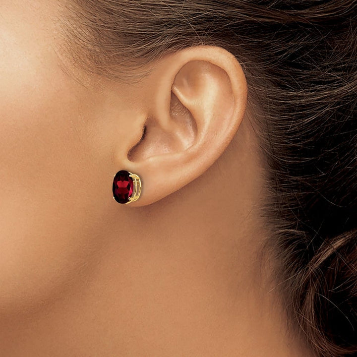 14K Yellow Gold 10x8mm Oval Garnet Post Earrings, view 3 of 4
