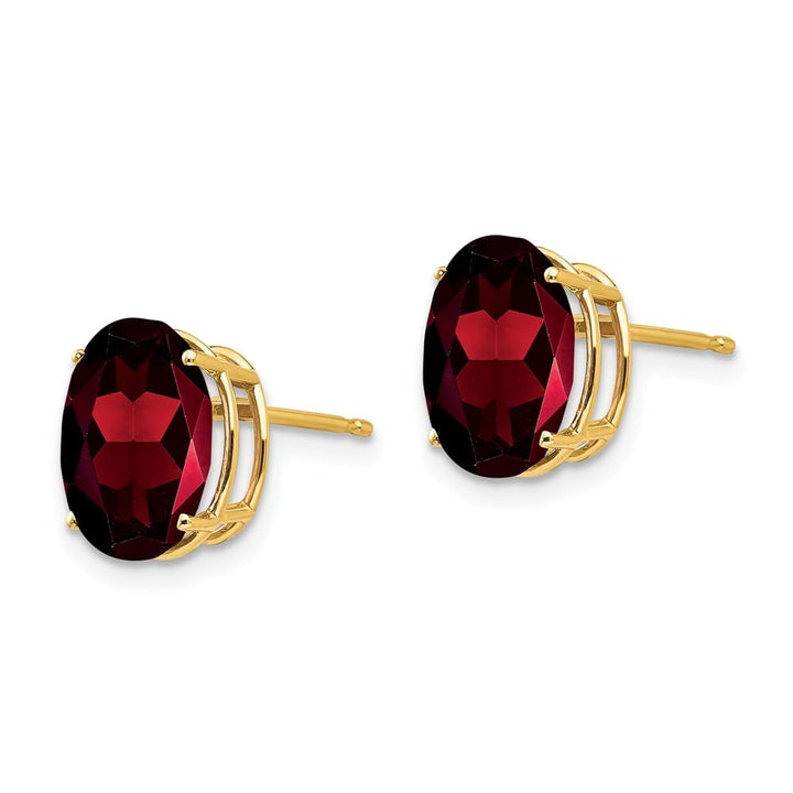 14K Yellow Gold 10x8mm Oval Garnet Post Earrings, view 2 of 4