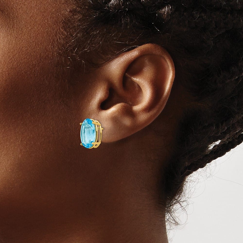 14K Yellow Gold 14x10mm Oval Blue Topaz Post Earrings, view 3 of 4