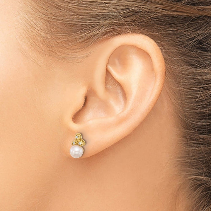 14K Yellow Gold 5-6mm White Button Freshwater Pearl and .06 Earrings
