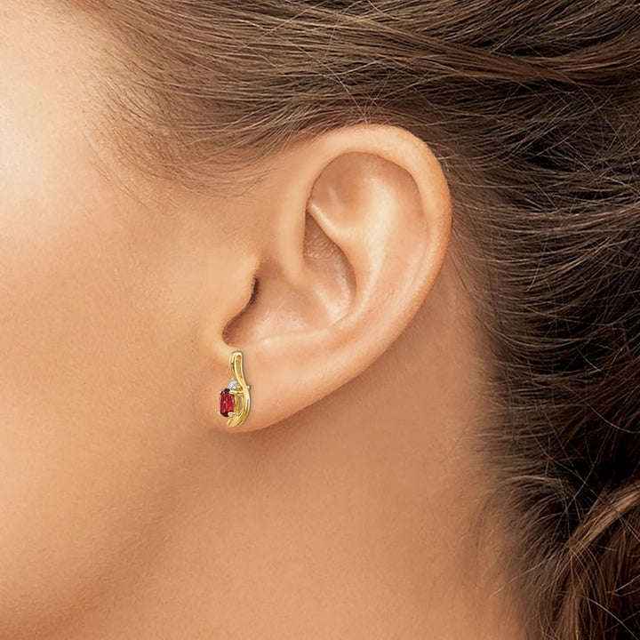 14K Yellow Gold 5x3 Oval January/Garnet and Diamond Post Earrings, view 3 of 4