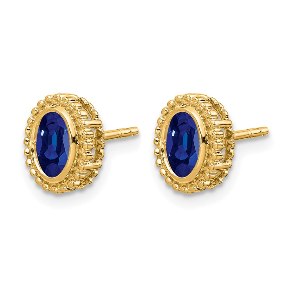 14K Yellow Gold 5x3mm Oval Sapphire Post Earrings, view 2 of 4