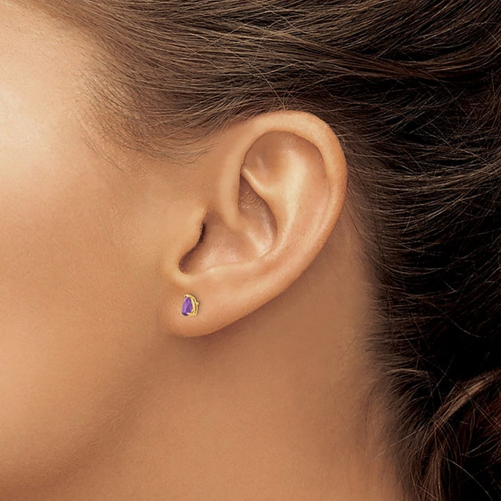 14K Yellow Gold 5x3mm Pear Amethyst Post Earrings, view 3 of 4