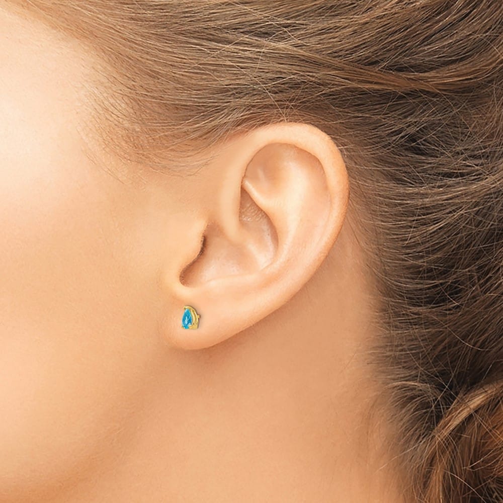 14K Yellow Gold 5x3mm Pear Blue Topaz Post Earrings, view 3 of 4