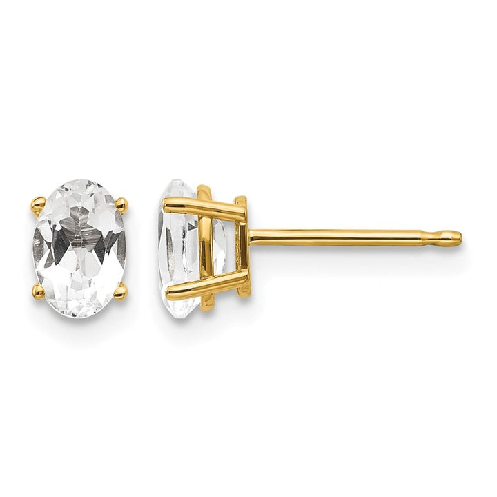 14K Yellow Gold 6x4 Oval April/White Topaz Post Earrings, view 1 of 4