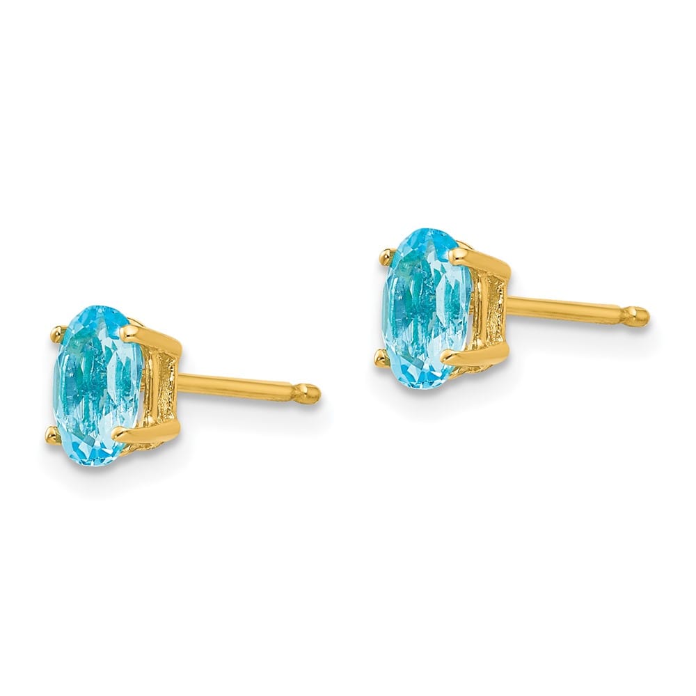 14K Yellow Gold 6x4mm Oval Blue Topaz Post Earrings, view 2 of 4
