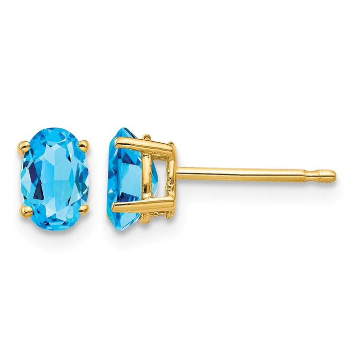 14K Yellow Gold 6x4mm Oval Blue Topaz Post Earrings, view 1 of 4