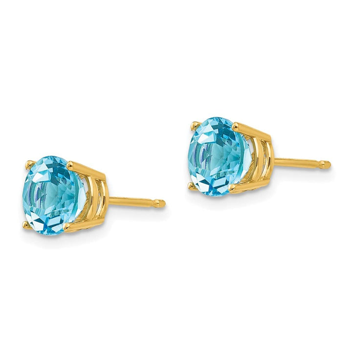 14K Yellow Gold 7mm Round Blue Topaz Post Earrings, view 2 of 4