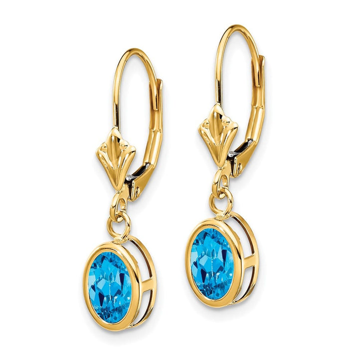 14K Yellow Gold 7x5mm Oval Bezel Leverback Dangle Earrings, Swiss Blue Topaz, view 18 of 24