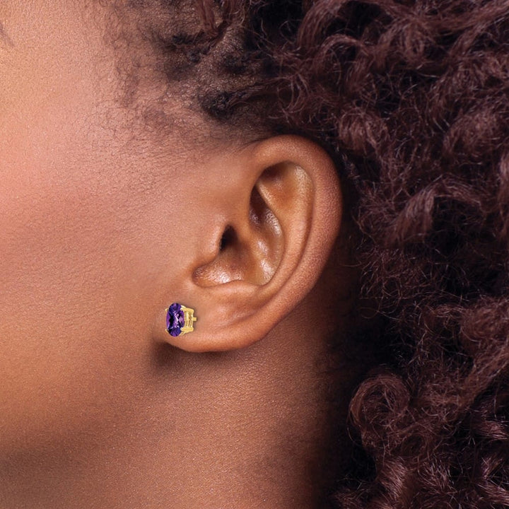 14K Yellow Gold 7x5mm Oval Checker-cut Amethyst Post Earrings, view 3 of 4