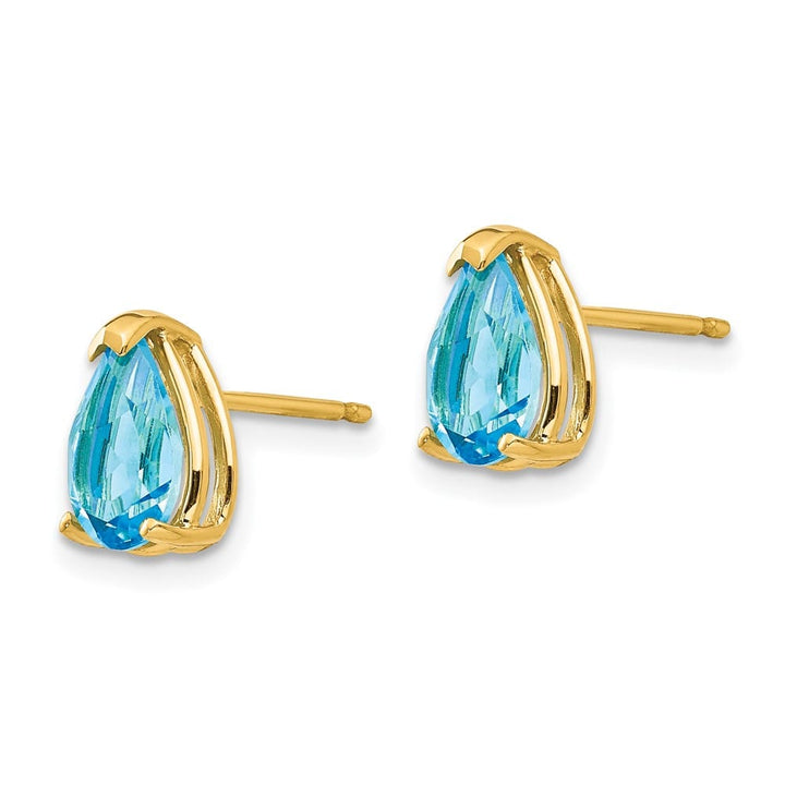14K Yellow Gold 8x5mm Pear Blue Topaz Post Earrings, view 2 of 4