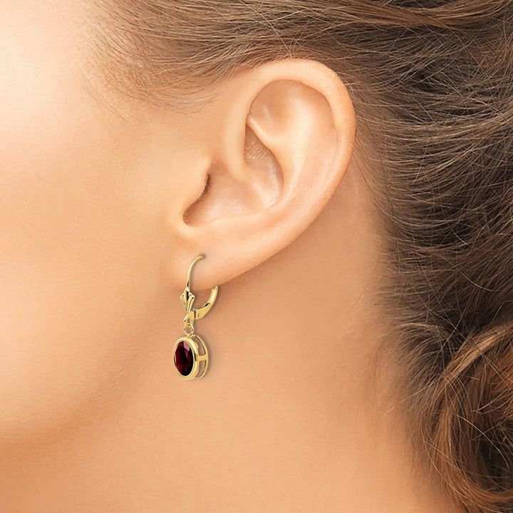 14K Yellow Gold 8x6mm Oval Lab Ruby Leverback Earrings, view 3 of 24