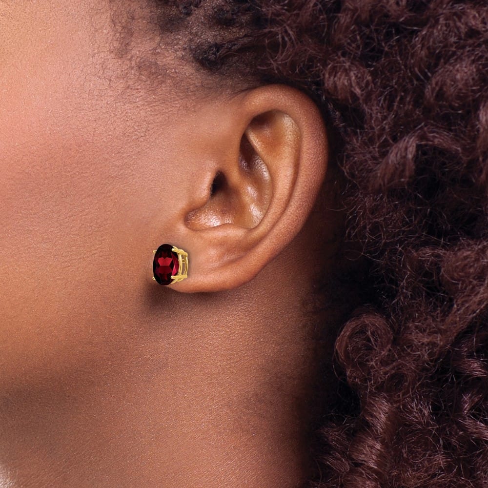 14K Yellow Gold 9x7mm Oval Garnet Post Earrings, view 3 of 4