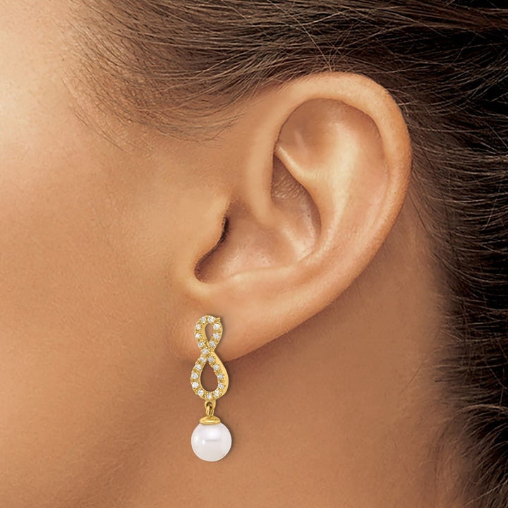 14K Yellow Gold Round Pearl .40 Carat Diamond Infinity Dangle Earrings, view 3 of 4