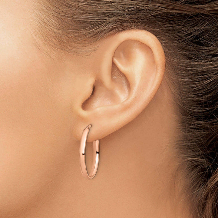 Lovely Rita's Earrings 10k Rose Gold Polished Finish Oval Hoop Earrings