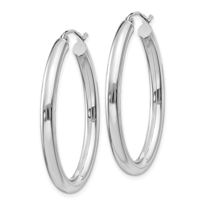 Lovely Rita's Earrings 14K White Gold Delicate Polished 28.2 mm Oval Tube Hoop Earrings