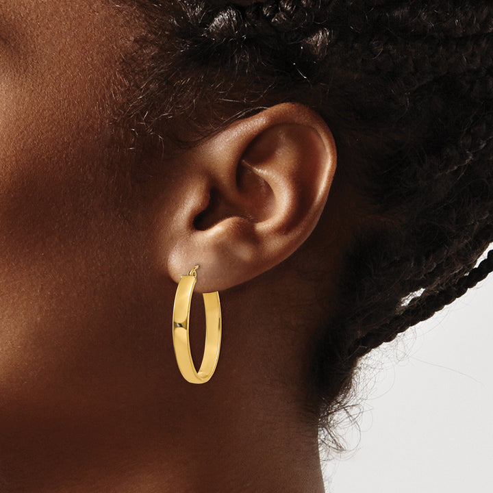 Lovely Rita's Earrings 14K Yellow Gold Brilliant Polished 19.5 mm Oval Tube Hoop Earrings