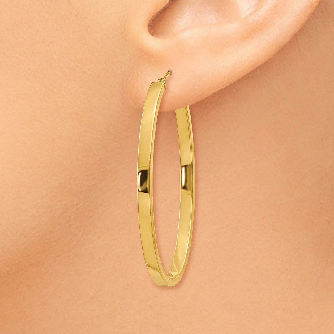 Lovely Rita's Earrings 14K Yellow Gold Luxurious Polished 3 mm Oval Tube Hoop Earrings