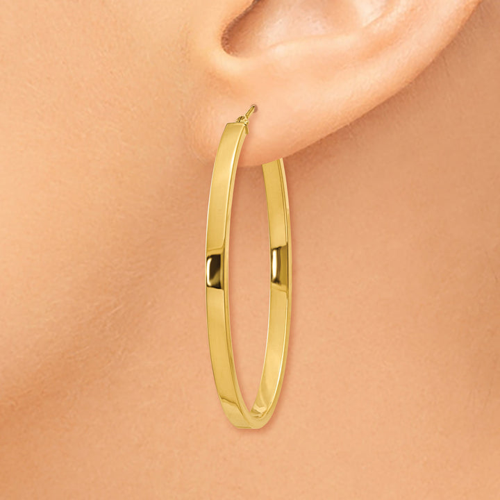 Lovely Rita's Earrings 14K Yellow Gold Luxurious Polished 3 mm Oval Tube Hoop Earrings