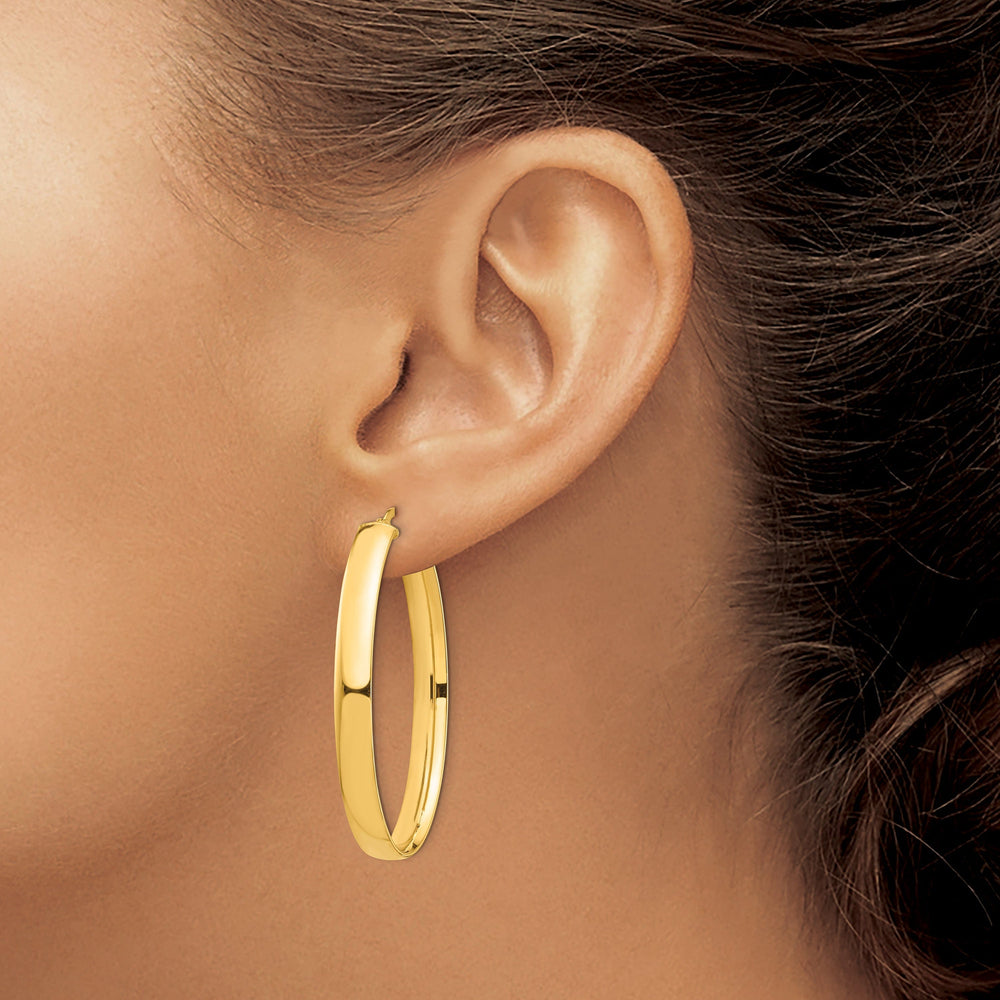 Lovely Rita's Earrings 14K Yellow Gold Modern Polished 27.41 mm Oval Tube Hoop Earrings