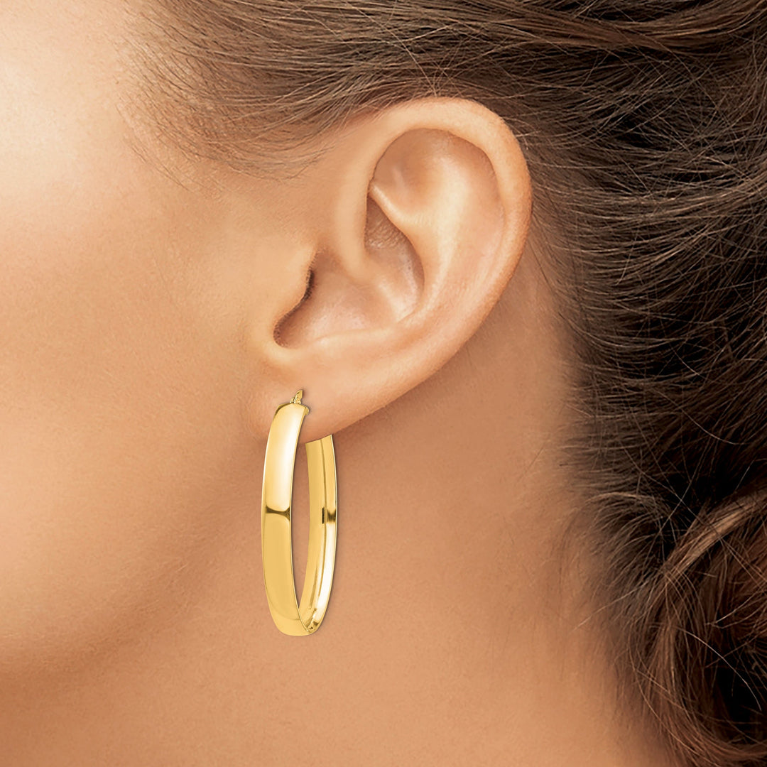 Lovely Rita's Earrings 14K Yellow Gold Stunning Polished 26.23 mm Oval Tube Hoop Earrings