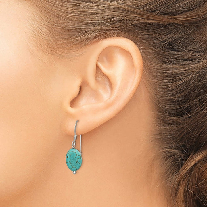 Sterling Silver Blue Reconstructed Magnesite Oval Dangle Earrings, view 3 of 4
