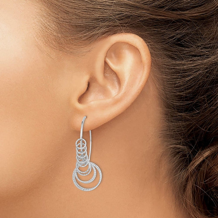 Sterling Silver D.C. Graduated Circle Dangle Hoop Earrings, view 3 of 4