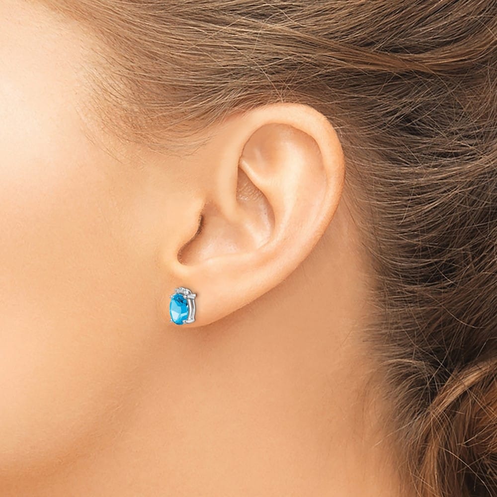 Sterling Silver Oval Blue Topaz and Diamond Post Earrings, view 3 of 4