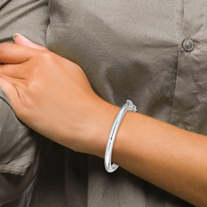 Sterling Silver Polished and D.C. 4mm Hinged Children's Bangle