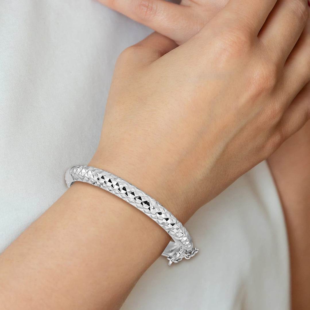 Sterling Silver Polished and D.C. 5.5mm Hinged Children's Bangle